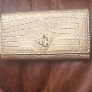 Gold Textured Wallet with Circular Closure